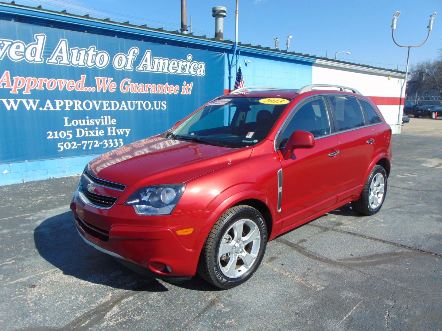 2015 Red Chevrolet Captiva Sport (3GNAL3EK6FS) with an 4-Cyl Flex Fuel 2.4 Liter engine, Automatic, 6-Spd transmission, located at 2105 Dixie Hwy, Louisville, KY, 40210, (502) 772-3333, 38.220932, -85.795441 - Photo#2